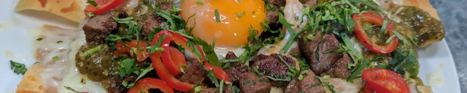 Petty Cash Taqueria Steak and Egg Nachos Recipe Petty Cash Taqueria Steak and Egg Nachos Recipe