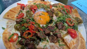 Petty Cash Taqueria Steak and Egg Nachos Recipe